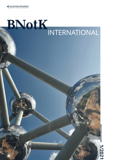 Bild: Cover der BNotK International mit Bildausschnitt des Atomiums in Brüssel